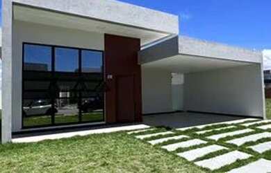 Imagem: A casa possui 3 Dormitórios, 3 Banheiros, 4 Vagas na garagem