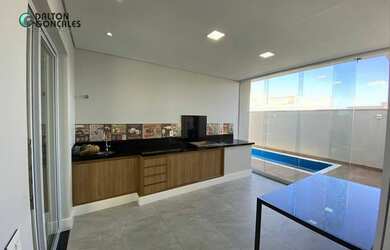 Imagem: A casa em condomínio possui 2 Dormitórios, 4 Banheiros, 4