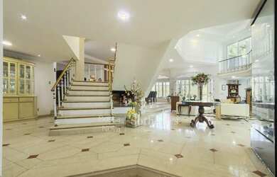 Imagem 4: Casa com amplos ambientes em condomínio fechado