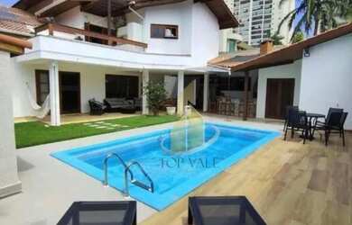 Imagem: A casa em condomínio possui 4 Dormitórios, 5 Banheiros, 5