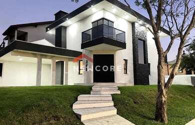 Imagem: A casa em condomínio possui 3 Dormitórios, 3 Banheiros, 2