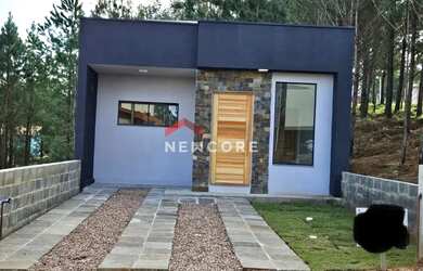 Imagem: A casa possui 2 Dormitórios, 1 Banheiro, 1 Vaga na garagem