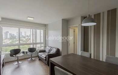 Imagem: O apartamento possui 2 Dormitórios, 1 Banheiro, 2 Vagas na