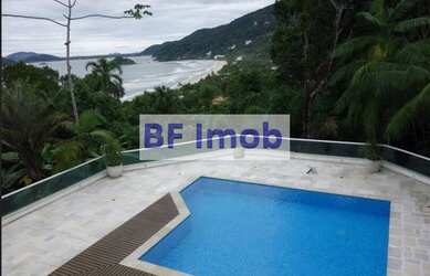 Imagem: A casa possui 5 Dormitórios, 5 Banheiros, 5 Vagas na garagem