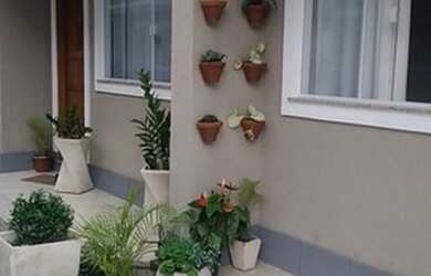 Imagem: A casa em condomínio possui 3 Dormitórios, 2 Banheiros, 1