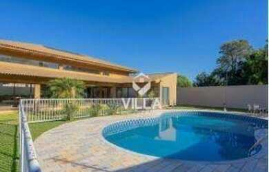 Imagem: A casa possui 4 Dormitórios, 4 Banheiros, 4 Vagas na garagem