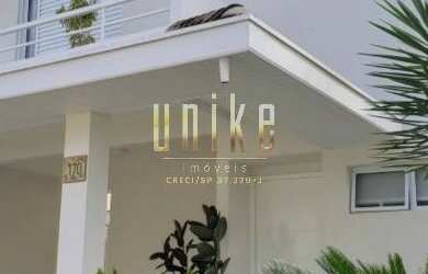 Imagem: A casa possui 3 Dormitórios, 5 Banheiros, 4 Vagas na garagem