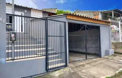 Imagem: A casa possui 2 Dormitórios, 1 Banheiro, 1 Vaga na garagem