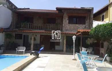 Imagem: A casa em condomínio possui 5 Dormitórios, 5 Banheiros, 3