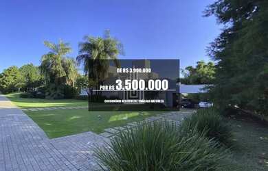 Imagem: A casa possui 2 Dormitórios, 5 Banheiros, 5 Vagas na garagem