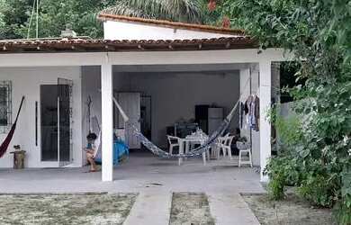 Imagem: A casa possui 2 Dormitórios, 3 Banheiros, 4 Vagas na garagem