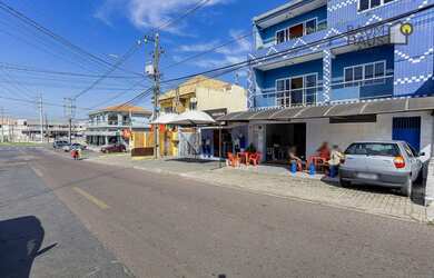 Imagem: A casa possui 3 Dormitórios, 5 Banheiros, 2 Vagas na garagem