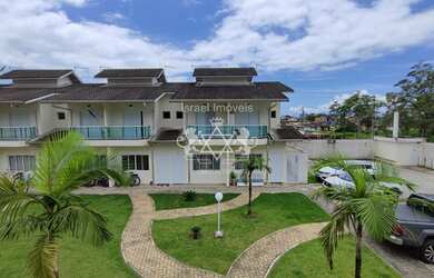 Imagem: A casa possui 2 Dormitórios, 1 Banheiro, 1 Vaga na garagem