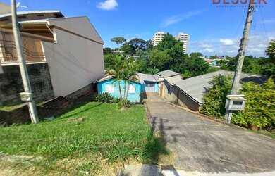 Imagem: A casa possui 2 Dormitórios, 1 Banheiro, 3 Vagas na garagem