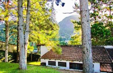 Imagem: A casa possui 3 Dormitórios, 3 Banheiros, 3 Vagas na garagem