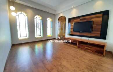 Imagem: A casa possui 4 Dormitórios, 3 Banheiros, 5 Vagas na garagem