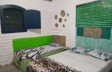 Imagem: A casa possui 2 Dormitórios, 2 Banheiros, 3 Vagas na garagem