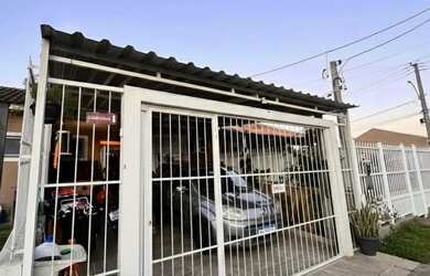 Imagem: A casa possui 2 Dormitórios, 2 Banheiros, 1 Vaga na garagem