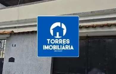 Imagem: A casa possui 2 Dormitórios, 2 Banheiros, 3 Vagas na garagem