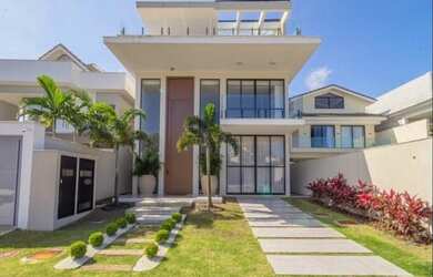 Imagem: A casa em condomínio possui 5 Dormitórios, 5 Banheiros, 3