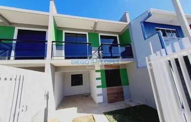 Imagem: A casa possui 2 Dormitórios, 2 Banheiros, 1 Vaga na garagem