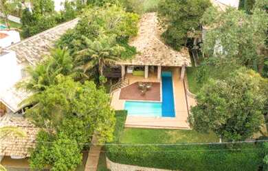 Imagem: A casa em condomínio possui 5 Dormitórios, 5 Banheiros, 5