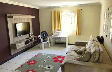 Imagem: A casa possui 3 Dormitórios, 3 Banheiros, 3 Vagas na garagem