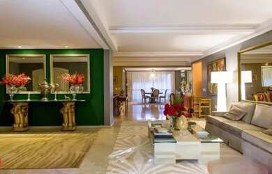 Imagem: A casa possui 4 Dormitórios, 5 Banheiros, 5 Vagas na garagem