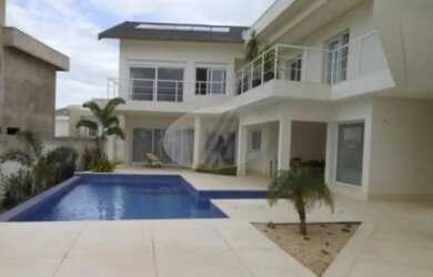 Imagem: A casa em condomínio possui 4 Dormitórios, 5 Banheiros, 5