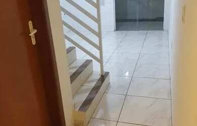 Imagem: A casa possui 2 Dormitórios, 2 Banheiros, 1 Vaga na garagem