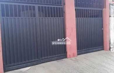 Imagem: A casa possui 2 Dormitórios, 2 Banheiros, 2 Vagas na garagem