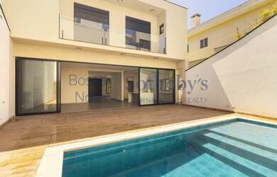 Imagem: A casa em condomínio possui 4 Dormitórios, 5 Banheiros, 2