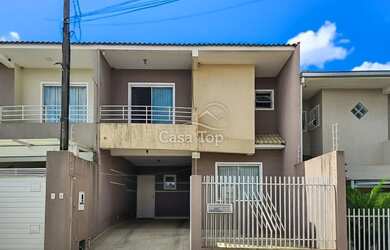 Imagem: A casa possui 3 Dormitórios, 3 Banheiros, 2 Vagas na garagem