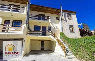 Imagem: A casa possui 2 Dormitórios, 3 Banheiros, 2 Vagas na garagem