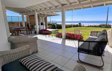 Imagem: A casa possui 5 Dormitórios, 4 Banheiros, 4 Vagas na garagem