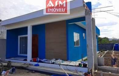 Imagem: A casa possui 3 Dormitórios, 2 Banheiros, 1 Vaga na garagem