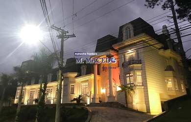 Imagem: A casa possui 5 Dormitórios, 5 Banheiros, 5 Vagas na garagem