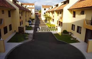 Imagem: A casa possui 3 Dormitórios, 3 Banheiros, 3 Vagas na garagem