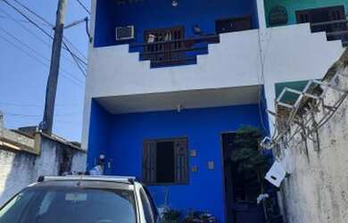 Imagem: A casa possui 2 Dormitórios, 1 Banheiro, 1 Vaga na garagem