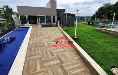 Imagem: A casa em condomínio possui 5 Dormitórios, 5 Banheiros, 4