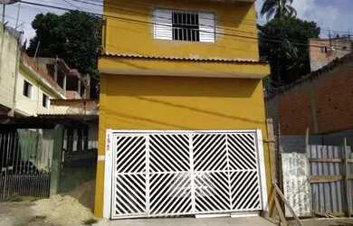 Imagem: A casa possui 3 Dormitórios, 1 Banheiro, 2 Vagas na garagem