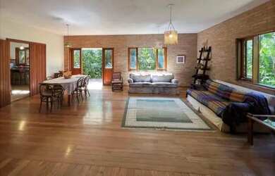 Imagem: A casa em condomínio possui 4 Dormitórios, 4 Banheiros, 3