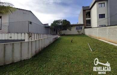 Imagem: A casa possui 4 Dormitórios, 2 Banheiros, 2 Vagas na garagem