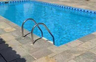 Imagem: A casa possui 4 Dormitórios, 5 Vagas na garagem e está localizado