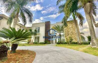 Imagem: A casa em condomínio possui 5 Dormitórios, 5 Banheiros, 4