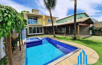 Imagem: A casa possui 4 Dormitórios, 3 Banheiros, 5 Vagas na garagem