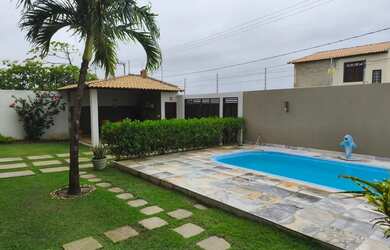 Imagem: A casa possui 5 Dormitórios, 5 Banheiros, 3 Vagas na garagem