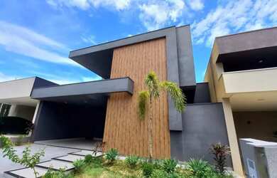 Imagem: A casa possui 3 Dormitórios, 4 Banheiros, 4 Vagas na garagem