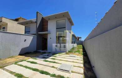 Imagem: A casa possui 3 Dormitórios, 2 Banheiros, 2 Vagas na garagem