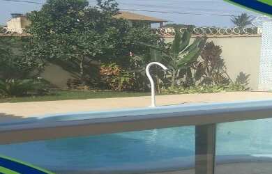 Imagem: A casa possui 4 Dormitórios, 2 Banheiros, 3 Vagas na garagem